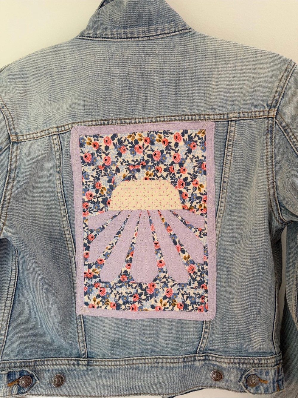 Upcycled Talula Jean jacket with a quilted coneflower on the back size M